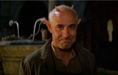 Stanley Tucci as a street sweeper Puck