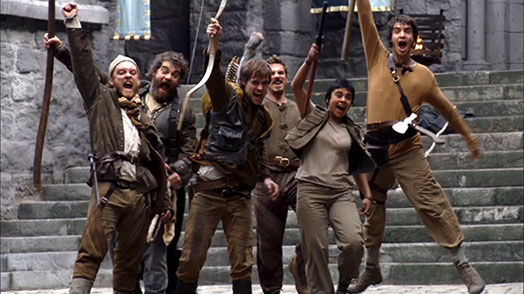 Jonas Armstrong as Robin Hood celebrates a victory with the outlaws