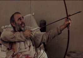 Robin (Sean Connery) prepares to shoot his last arrow
